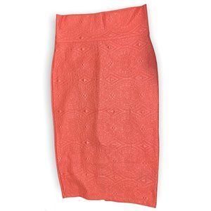 BeBe Medium size Pencil Skirt Coral with embossed design. New no tags